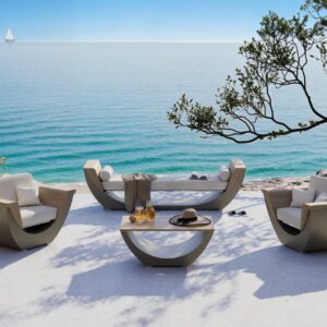 Masuria Narie design loungeset met loungebank, twee fauteuils en salontafel op een terras aan zee